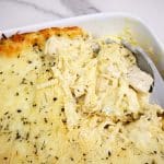 Chicken Tetrazzini casserole in a white baking dish.