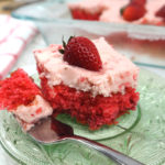 strawberry sheet cake with jello slice on a green plate.