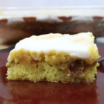 honey bun cake slice on a red plate.