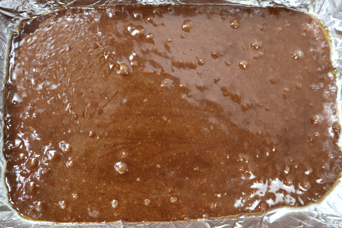 brownes mixture added to a rectangular baking dish.