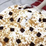kahlua cake trifle with a large spoon.