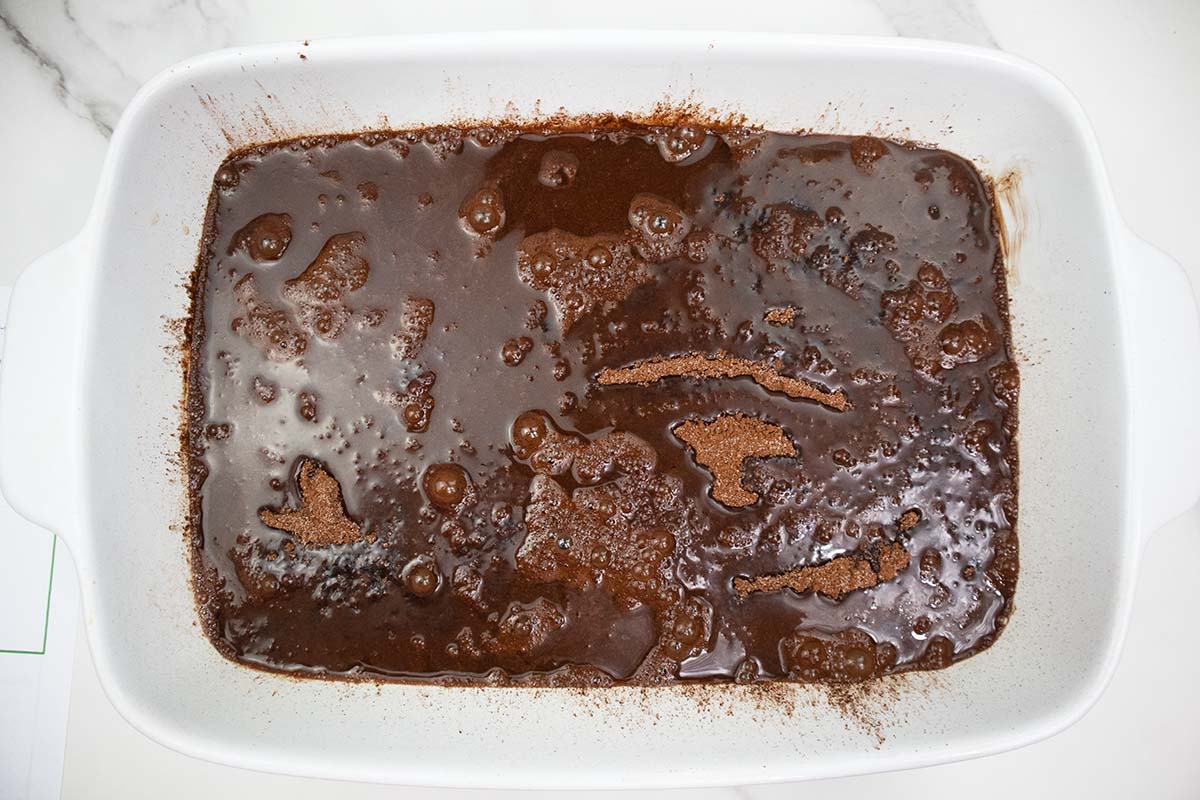 Hot water poured over cake batter.