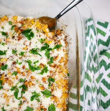 Mexican street corn bake in a glass baking dish.