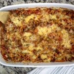 serving stuffed pepper casserole on wooden spoon