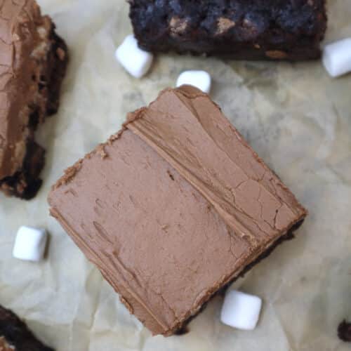 slices of mississippi mud brownies on brown parchment paper.