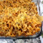 beef cheese noodle baked in glass pan.