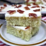 two slices of maple bacon sheet cake on top of each other.