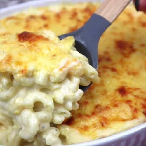 mac and cheese served on a large spoon.