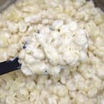 panera mac and cheese in a large metal pot.