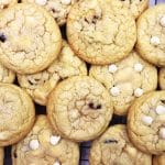 white chocolate cranberry cookies on a wire rack.
