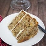 Hummingbird Cake slice on a white plate.