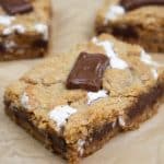 smores bar slice on natural parchment paper.