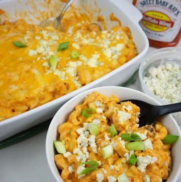 Buffalo Chicken Mac and Cheese in a white baking dish and white bowl.