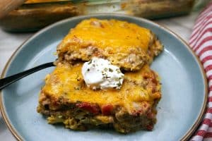 King Ranch Casserole slices on a blue plate.